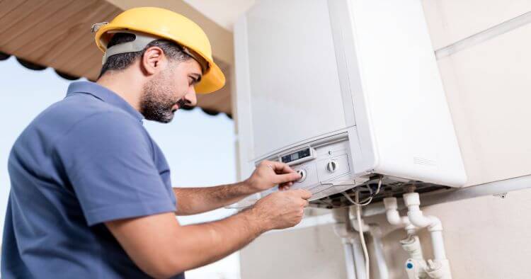 Man Fixing Boiler